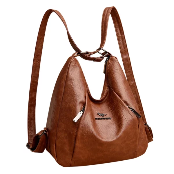 Mångsidig brun handväska som även kan bäras som ryggsäck. Perfekt kombination av stil och funktion för en aktiv livsstil.